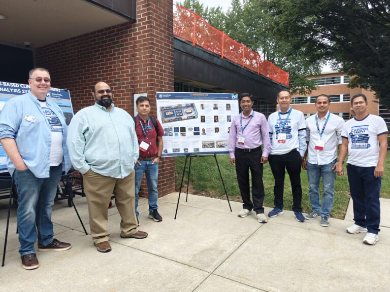 Faculty members and collaborators showcase the AI Immersive Lab exhibit and poster presentation during Penn State Harrisburg's 60th Anniversary Celebration, highlighting ongoing research, educational initiatives, and emerging technology projects.